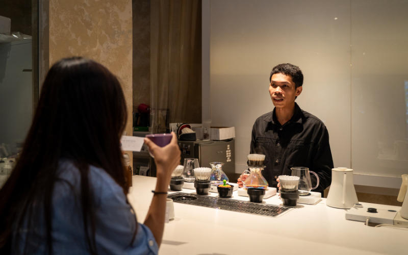 Barista serve coffee at Tatido Coffee Roasters